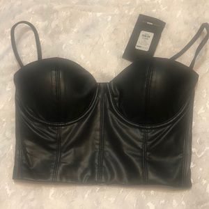 Spot a faux leather bustier top